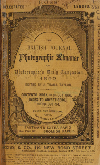 The British journal photographic almanac and photographer's daily companion, book, annotation: '95-', collector's mark: 'Free Pulic Library of New Haven', date: 'MAY 1994', editor (person who revises): James Traill Taylor, publisher: various manufacturers, 1859 - 1861, editor (person who revises), paper, printing, gelatin silver print, collotype, developing gelatin silver print, height 182 mm x width 133 mm x thickness 56 mm, A worn paper cover with ornate black printed borders and decorative corner designs surrounding central printed text; an arch-like patterned frame at the top contains radiating linework, ornamental flourishes, and two stylized vine motifs; the central area features a variety of typographic styles including a prominent ornate title in a dark ink, smaller serif and script text blocks, and a horizontal boxed label near the bottom; two illustrated tripod-mounted cameras or apparatus are positioned symmetrically at lower left and right within the frame; marginal handwri...