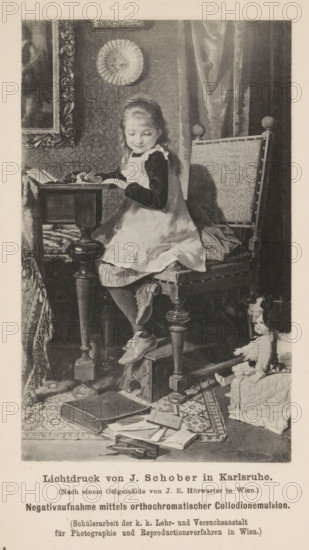 Reproduction of a painting of a writing girl by Joseph Eugen Hörwarter, reproduction, page, photomechanical print, inscription: 'Negativaufnahme mittels orthochromatischer Collodionemulsion, Beilage zu Eder's Jahrbuch für Photographie 1890.', photographer: KK Lehr- and Versuchsanstalt für Photographie, cliché maker: J. Schober, Karlsruhe, after painting by Joseph Eugen Hörwarter, c. 1885 - in or before 1890, KK Lehr- und Versuchsanstalt für Photographie, J. Schober, Joseph Eugen Hörwarter, photographer, cliché maker, after painting by, Baden-Württemberg, paper, collotype, photoprint, height 139 mm x width 85 mm, Print on eleventh unnumbered page after page 400., historical persons - BB - woman, girl (child between toddler and youth), A young girl wearing a light apron over a dark dress sits on an upholstered wooden chair at a small table, holding a pen and looking down at paper on the table; she has long hair pulled back and wears stockings and tied shoes with one foot resting on a sma...