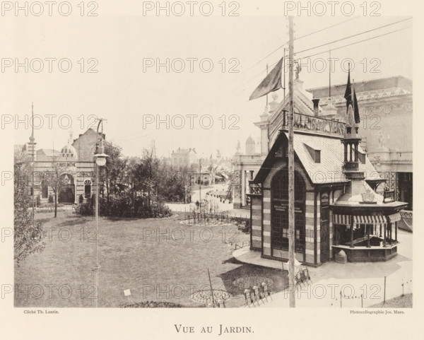 Vue au jardin, Garden on the grounds of the world exhibition in Antwerp, page, photomechanical print, photographer: Th. Lantin, Antwerp, printer (person): Joseph Maes, c. 1890 - in or before 1894, printer (person), paper, collotype, photoprint, height 161 mm x width 220 mm, garden, facade (of house or building), A sepia-toned scene shows a grassy open area in the foreground with a small circular planted bed and a single small sign, bordered by a path and a row of outdoor chairs; to the right a multi-story pavilion with steep gabled roofs, ornate eaves, a small balcony, striped awnings, decorative columns, and flags on tall poles rises above the ground; behind and beside the pavilion are classical building facades with sculptural statues, domes, balustrades, and ornamental rooflines, and a distant tree-lined avenue with smaller structures and lamp posts extends toward the background; scattered trees and shrubs occupy the left and center ground, and a tall slender lamppost and utility po...