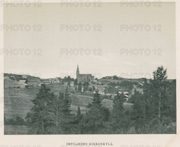 View of a village, Impilahden kirkonkylä, page, photomechanical print, photographer: Impi Backman, cliché maker: anonymous, printer (person): Weilin & Göös, c. 1888 - c. 1893, printer (person), paper, autotypie, height 156 mm x width 206 mm, city-view in general, 'veduta', church (exterior), Karelia, A wide landscape view showing a rural village with scattered houses and farm buildings set among rolling fields and clusters of trees, a prominent church with a tall steeple near the center, a road winding through the settlement, dense treetops and open meadow areas in the foreground, and a broad pale sky occupying the upper portion of the image.