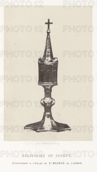 Reliquaire en argent, Silver reliquary from the Saint-Maurice church in Saint-Maurice-de-Lignon, photograph, page, number: 'PL. 10.', inscription: 'appartenant a l'eglise de St. Maurice du Lignon.', photographer: Hippolyte Malègue, France, c. 1850 - in or before 1857, Hippolyte Malègue, photographer, paper, salted paper print, height 208 mm x width 136 mm, relics (and reliquaries), A tall ornamental object with a cross at its top stands on a flared base; the object has a tapered spire above a cylindrical midsection with decorative detailing, a rounded central knop, and a wide, flat foot with a scalloped outline, shown against a plain light background.