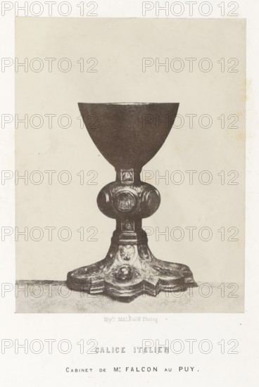 Italian chalice, Calice italien, photograph, page, number: 'PL. 11.', inscription: 'cabinet de Mr Falcon au Puy.', photographer: Hippolyte Malègue, France, c. 1850 - in or before 1857, paper, salted paper print, height 180 mm x width 140 mm, chalice, A monochrome photograph of a chalice centered on a plain light background, showing a smooth bowl atop a short stem that joins a rounded decorative node with carved circular motifs, which leads down to an ornate base with layered, scalloped edges and carved floral or emblematic details; the chalice sits on a flat surface and the image has a narrow border around it.