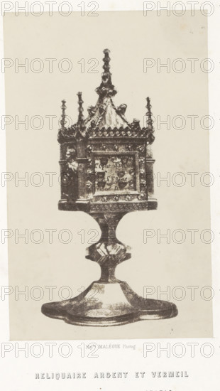 Reliquaire argent et vermeil, Silver reliquary from a church in Gazac, photograph, page, number: 'PL. 8.', inscription: 'appartenant a l'eglise de Grazac', photographer: Hippolyte Malègue, France, c. 1850 - in or before 1857, Hippolyte Malègue, photographer, paper, salted paper print, height 210 mm x width 130 mm, relics (and reliquaries), A photographic image of an ornate metal reliquary on a pedestal, shown against a plain light background; the reliquary has an elaborate square central case with decorative columns at the corners and a relief figure on one side, topped by a steep, sculpted roof with finials and small spire-like ornaments; the case sits on a turned stem with faceted and curved sections leading to a broad, shaped base with a slightly raised circular platform; the metal surface shows varied textures and darker patina in recessed areas, and the overall composition is centered vertically in the frame.