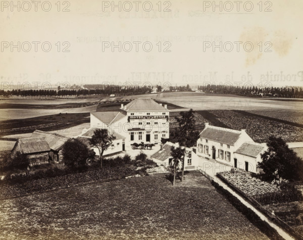 View of the Hôtel du Musée te Waterloo, Waterloo, photograph, page, name: '(Phot. de Brand frères, rue de la Madeleine, 32.)', photographer: Brand Frères, c. 1862 - c. 1872, paper, albumen print, height 150 mm x width 187 mm, Photo on page 15., rural housing, eg country-house, villa, cottage, façade (or house or building), A wide sepia-toned panoramic view shows a rural landscape with several white buildings clustered near the center, including a prominent multi-story house with a pitched roof and decorative facade, flanked by smaller houses with tiled roofs. In front of the main house a horse-drawn carriage is parked near a courtyard area and a few trees stand nearby. Surrounding the buildings are cultivated fields and garden plots with visible rows of plants, separated by narrow paths and low fences. A line of trees and hedgerows runs across the middle distance, and beyond them open flat farmland stretches to the horizon under a pale sky. The foreground consists of a large textured f...