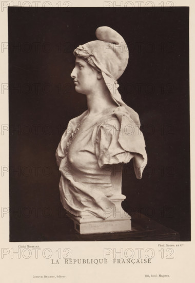 La République Française, Sculpture by Jean Gautherin, depicting a personification of the French republic, page, photomechanical print, inscription: '126, boul. Magenta.', photographer: Charles Michelez, cliché maker: Goupil & Cie., publisher: Ludovic Baschet, c. 1876 - in or before 1879, Jean Gautherin, after sculpture by, paper, Woodburytype, height 240 mm x width 187 mm, piece of sculpture, reproduction of a piece of sculpture, A monochrome photograph of a sculpted bust of a woman shown in profile facing left, wearing a soft cap with a rounded top and a trailing piece of fabric, with short wavy hair visible at the forehead; she has a straight nose, closed lips, and a smooth neck, and is dressed in draped, folded fabric over her shoulders and chest with visible creases and gathers, the sculpture mounted on a rectangular base against a dark plain background with a wide light border around the image.