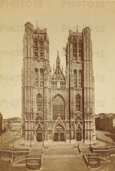 Facade of the Cathedral of Saint Michael and Saint Gudula in Brussels, Belgium, photograph, Brussels, 1851 - 1900, photographer, pasteboard, paper, albumen print, height 350 mm x width 273 mm, church (exterior), St. Michael and St. Gudula Cathedral, A sepia-toned photograph of a large Gothic cathedral facade with two tall towers flanking a central gabled section, ornate pointed arches, and detailed stone carvings; the central portion features a large pointed stained-glass window above three arched doorways, each set within richly sculpted surrounds; steep stone steps lead up to the entrance, with balustrades and lamp posts lining the approach; the towers show multiple narrow lancet windows, decorative buttresses, and pinnacles, and a narrow spire rises from the central gable; low buildings and streets are visible on either side of the cathedral.