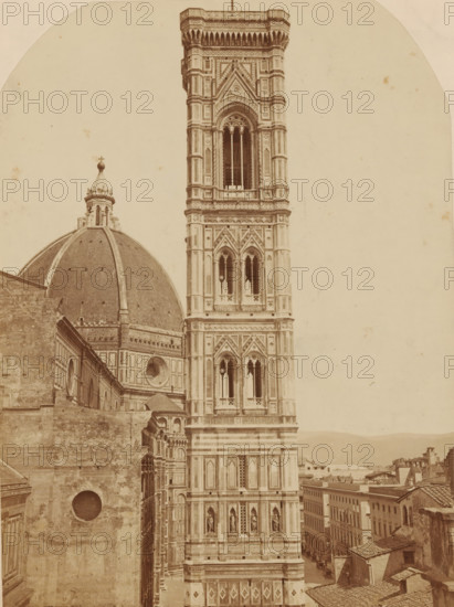 FIRENZE. CAMPANILE DI GIOTTO, Campanile di Giotto and the dome of the Cathedral in Florence, photograph, number: '3018.', Florence, c. 1875 - c. 1900, photographer, Tuscany, paper, pasteboard, albumen print, height 247 mm x width 183 mm, parts of church exterior and annexes: campanile, A sepia-toned photograph shows a tall ornate bell tower with patterned stonework, arched windows, and decorative columns adjacent to a large domed structure with a lantern topped by a small cross. The tower features multiple levels of intricate geometric and floral ornamentation and niches containing sculpted figures. The dome has visible ribs and a tiled surface, with patterned lower walls and round windows. In the foreground there are textured stone walls and rooftops of nearby buildings, and a narrow street lined with multi-story structures receding beside the tower. The sky is empty and pale, occupying the upper background.