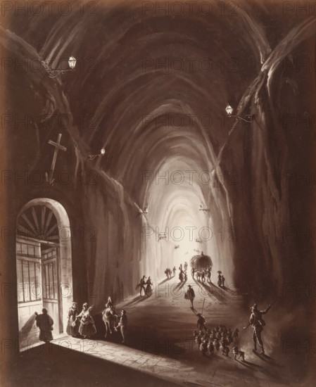 Piedió... Napoli, Photographic reproduction of a view of a cave, album page, photograph, reproduction, This photo is part of an album., number: '1141', workshop stamp: 'Giorgio Sommer, Largo Vittoria, Napoli', photographer: Giorgio Sommer, Naples, 1874 - in or before 1879, paper, albumen print, height 254 mm x width 205 mm, cave, grotto, painting, drawing and the graphic arts, A tall, vaulted passage lit from a bright opening at its far end shows arched rock walls with mounted lanterns along their sides, long shadows stretching toward the viewer. Near the bright opening, small groups of figures walk along the floor, some silhouetted, some leading an animal-drawn cart topped with a rounded load. Closer to the foreground, a cluster of figures stand near a large open doorway with an arched top and barred gate partially ajar, light spilling across the stone threshold. Along the right foreground, a person gestures while a group of small animals moves ahead in formation, casting elongated sh...