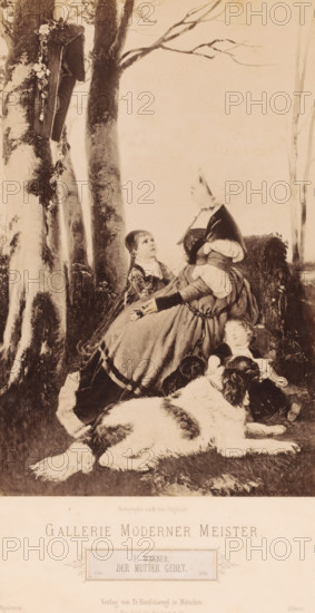 Reproduction of painting 'Der Mutter Gebet' by F. Wagner, Gallerie Moderner Meister, photograph, Genre scene of a mother with two children and a dog, praying before a crucifix on a tree, caption: 'Photograph after the original., GALLERIE MODERNER MEISTER, F. WAGNER, DER MUTTER GEBET, Verlag von Fr. Hanfstaengl in München, New York, Geo Kirchner & Co.., Registered, Déposé', photographer: Franz Hanfstaengl Kunstverlag A.-G., München, c. 1879 - c. 1900, Bavaria, Munich, pasteboard, paper, albumen print, height 248 mm x width 166 mm, height 321 mm x width 483 mm, A sepia-toned scene shows a woman seated on grass beneath tall trees, wearing a long dress with layered skirts and a headscarf, her hands clasped at her lap and her face turned upward; beside her a young girl kneels looking up toward the woman, dressed in a patterned garment with braided hair; at the woman's feet a small child reclines against her skirt with eyes closed, and a large dog with a thick coat lies in front of them, its...