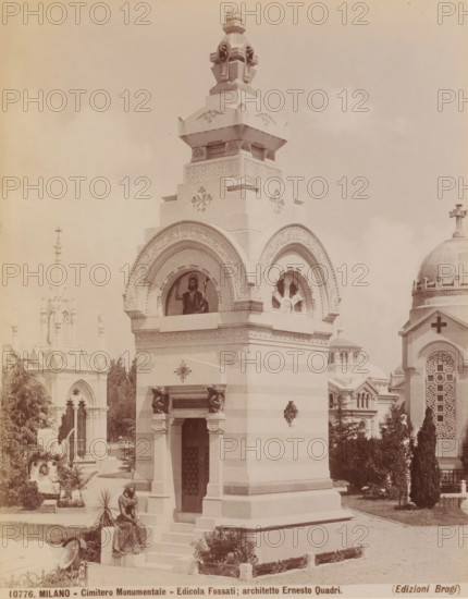 Edicola Fossati, Cimitero Monumentale, Milan, Italy, photograph, Tomb designed by Ernesto Quadri, Cimitero Monumentale cemetery, Italy., caption: '10776. MILANO - Cimitero Monumentale - Edicola Fossati, architetto Ernesto Quadri.', caption: '(EDIZIONI BROGI)', photographer: Edizioni Brogi, Florence, publisher: Giacomo Brogi, c. 1860 - c. 1890, Tuscany, pasteboard, paper, albumen print, height 250 mm x width 195 mm, height 330 mm x width 510 mm, Lombardy, A tall stone mausoleum with layered decorative tiers and carved reliefs dominates the foreground, featuring an arched niche with a painted religious figure and an adjacent circular tracery window, ornate cornices, and sculpted ornamental details; a seated bronze or metal statue of a woman rests on the base steps at the front, near a potted plant and low decorative fence elements; surrounding the mausoleum are trees and landscaped shrubs, a domed building with a cross and patterned facade is visible to the right, and a Gothic-style stru...