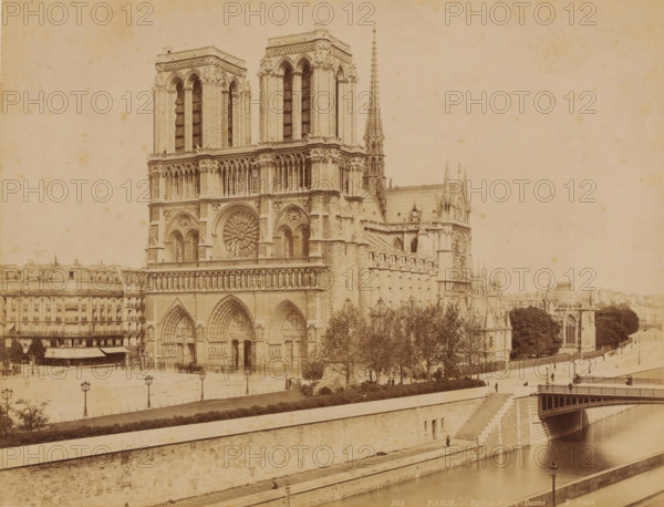 Notre Dame, Paris, photograph, France., inscription: '223. PARIS. - Eglise Notre-Dame', signature: 'X. Phot.', photographer: X photo., in or after 1870 - c. 1900, A sepia-toned photograph shows a large Gothic cathedral with twin towers, tall arched windows, a circular rose window, ornate sculpted façades and three grand arched doorways at street level; a tall slender spire rises behind the towers above the roofline, and buttresses and decorative pinnacles line the side of the building. In front of the cathedral there is a broad open plaza with lamp posts and a few small groups of people and horse-drawn carriages. To the left of the cathedral a row of multistory buildings with mansard roofs and awnings faces the plaza. Trees and planted areas sit between the cathedral and a stone embankment that runs along a river in the foreground, where stone steps descend to a lower walkway and a bridge spans the river. The scene is quiet and detailed, with architectural ornamentation visible across ...