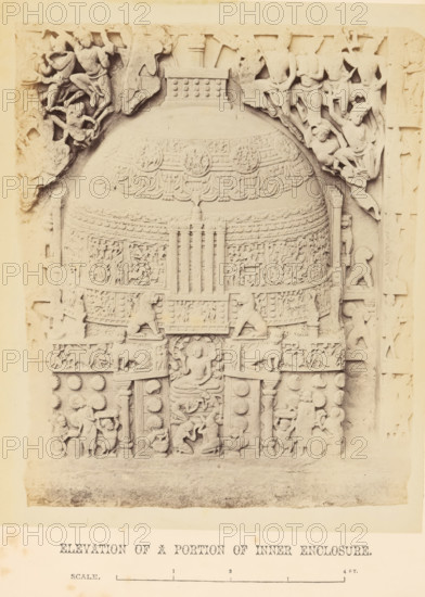 Relief with a religious scene, Amaravati, Andhra Pradesh, India, photograph, page, inscription: 'ELEVATION OF A PORTION OF INNER ENCLOSURE., SCALE.', inscription: 'AMRAVATI. PLATE LXXVI.', photographer: William H. Griggs, c. 1863 - in or before 1868, South India, paper, albumen print, height 221 mm x width 181 mm, Photo two pages after page 198., Hinduism, Buddhism, Jainism, A photograph of a carved stone relief showing a large rounded central dome-like structure covered in ornamental bands and intricate low-relief figures, flanked by carved human and animal figures in various poses. The central panel features a seated figure within a framed niche, with stylized lions and decorative motifs around. The upper sections show figures in dynamic stances and draped garments amid scrolling foliage, while the lower sections contain smaller narrative scenes and decorative rosettes. A plain margin surrounds the relief, and a separate lower strip contains printed content that is not described.