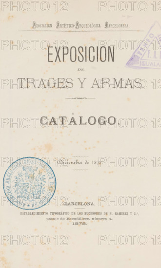 Album fotográfico de la exposition de trajes y armas, celebrada por la Asociación Artístico-Arqueológica Barcelonesa, enero de 1879., book, annotation: 'OCT, 1991', 1878, pasteboard, paper, textile materials, printing, albumen print, albumen printing, height 245 mm x width 179 mm x thickness 25 mm, A worn, aged paper page with large printed headings in bold serif type arranged vertically down the center, decorative rule lines, and ornamental dividers; brownish spotting and foxing marks scattered across the page; a purple triangular stamp partially visible near the top right edge and a circular blue embossed seal with intricate floral and trophy motifs near the lower left; smaller lines of printed text and a faint ornamental flourish toward the middle; overall cream background with uneven discoloration and a narrow blank margin around the edges.