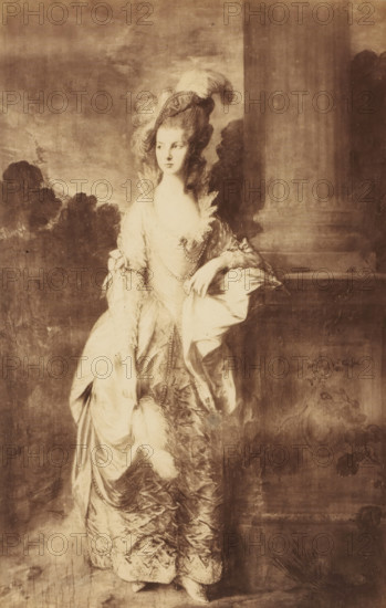 Photo reproduction of The Honorable Mrs Graham by Thomas Gainsborough, Mrs. Graham, by Gainsborough, photograph, reproduction, page, annotation: 'A.reg', number: 'No. 56., MODERN.', inscription: 'In the Collection of R. Graham, Esq., London, Published Augt, 1857, by P. & D. Colnaghi & Co, 13 & 14, Pall Mall East & T. Agneur & Sons, Manchester., For the Proprietors.', number: '28', photographer: Leonida Caldesi, photographer: Mattia Montecchi, after painting by Thomas Gainsborough, c. 1853 - in or before c. 1858, paper, albumen print, albumendruk, height 278 mm x width 178 mm, historical persons not known by name - BB - woman, A sepia-toned portrait of a woman standing in elaborate historical dress, wearing a high powdered hairstyle topped with a feathered hat and a fitted gown with ruffled and draped fabric, lace trims, and beaded adornments; one hand rests on a draped surface while the other holds part of her skirt, and a feathered accessory hangs from the front of the skirt; the back...