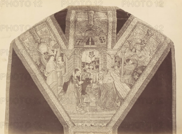 Chasuble from a church in Lier, displayed at an exhibition on religious objects from the Middle Ages and Renaissance in 1864 in Mechelen, photograph, page, number: '13', photographer: Joseph Maes, Mechelen, 1864, paper, albumen print, height 194 mm x width 258 mm, chasuble, Period, A triangular textile panel with ornate embroidered borders surrounds a central scene showing figures inside an arched architectural interior; two kneeling figures face each other near a small enclosed manger while a seated figure and a standing figure with a staff are nearby, and additional standing figures and angels appear along the sides; the embroidered architecture includes columns, arches, a tiled floor, and a window revealing a landscape with trees and distant buildings; patterned woven trims frame the scene and extend outward against a dark background on either side.