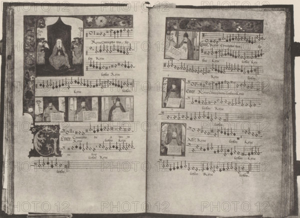 Manuscript on parchment, displayed at an exhibition on religious objects from the Middle Ages and Renaissance in 1864 in Mechelen, page, photomechanical print, number: '16', number: '-48', number: '16 GG', photographer: Joseph Maes, Mechelen, clichémaker: Simonau & Toovey, Antwerp, 1864 - in or before 1866, paper, photolithography, height 198 mm x width 266 mm, manuscript of musical score, parchment, vellum (writing material), Period, 1864, A grayscale photograph of an open book showing two facing pages with printed musical staff lines and square-shaped musical notes, decorated rectangular illustrations inset among the staves, and ornate vertical borders featuring floral and figurative ornamentation; the left page contains a large framed scene at the lower left and a narrow decorative band along the inner margin, while the right page shows multiple small framed portraits or scenes aligned horizontally across the center; the pages have a worn, textured appearance with darker edges and a...