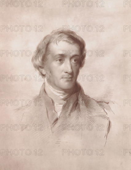 Photo reproduction of a drawing depicting a portrait of Julius Charles Hare, reproduction, page, photomechanical print, cliché maker: Woodbury Permanent Photographic Printing Company, after drawing by George Richmond, c. 1866 - in or before 1876, photographer, paper, Woodburytype, height 117 mm x width 92 mm, Person, Julius Charles Hare, historical persons, A sepia-toned portrait drawing of a man shown from the chest upward, featuring softly shaded hair with wavy locks, a smooth forehead, and attentive eyes looking slightly to the side, a straight nose, and closed lips; he wears a high-collared shirt and a coat with visible sketch lines and crosshatching, all rendered against a lightly textured, mottled background.