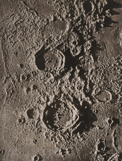 Plaster model of the moon craters Aristotle and Eudoxus, seen from above, Das Ringgebirge Aristotle und Eudoxus, page, photomechanical print, number: 'Tafel IX.', photographer: James Nasmyth, cliché maker: Strumper & Co, Hamburg (city), c. 1863 - in or before 1873, paper, collotype, photoprint, height 171 mm x width 132 mm, surface of the moon, Moon, A grayscale close-up of a heavily cratered, textured surface showing large circular depressions with raised rims surrounded by rough, uneven terrain and numerous smaller pits, shadows accentuating depth and irregular ridges, with areas of smoother, pockmarked plains contrasting against jagged, rugged highlands.