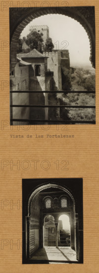 Alhambra, photograph, Sheet with two photographs from the study collection of the Art History Institute of the University of Amsterdam., inscription, stamp: 'UNIVERSITY OF AMSTERDAM, ART, HISTORICAL, INSTITUTE', Spain, c. 1860 - c. 1930, photographer, paper, kraft paper, gelatin silver print, developing gelatin silver print, height 109 mm x width 80 mm, height 79 mm x width 57 mm, height 315 mm x width 258 mm, Andalusia, Granada, A black and white photograph framed by an ornate scalloped arch shows a stone fortress with tiled roofs, crenellated walls, and a square tower rising behind trees on a hillside; a balcony with columns and a railing overlooks a steep drop beside vegetation, and horizontal bars cross the lower foreground.