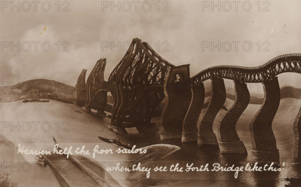 Heaven help the poor sailors when they see the Forth Bridge like this!, Davidson's Real Photographic Series, photograph, picture postcard, Scotland, publisher: Davidson Brothers, London, 1905 - 1911, Davidson Brothers, photographer, publisher, paper, baryta paper, daylight gelatin silver print, height 85 mm x width 134mm, cantilever bridge, Forth Bridge, A sepia-toned photograph shows a large arched metal bridge with ornate latticework spanning a body of water, the bridge supports appearing distorted and wavy. Several tall, curved steel trusses rise from the piers, their repeating vertical and diagonal members visible. The stone piers stand in the water and cast reflections. Small boats are moored along a riverbank beneath the bridge and a shoreline with low hills appears in the background. The sky is cloudy and the image has scratches and age marks across its surface.