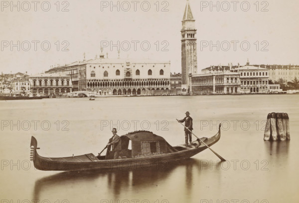 View of the Doge's Palace, the Campanile and surrounding buildings in Venice with a gondola in the foreground, Venezia - panorama e gondola, photograph, Part of Topographical album of Venice 1881., check stamp: 'Carlo Ponti Venezia', negative number: '1', photographer: Carlo Ponti, Venice, 1860 - 1881, Carlo Ponti, photographer, paper, albumen print, height 199 mm x width 258 mm, prospect of city, town panorama, silhouette of city, canals, waters (in city), palace, tower, clock tower, monumental adornment, gondola, Roman Catholic Church, travel, Doge's Palace, St. Mark's Square, Campanile di San Marco, A sepia-toned waterfront scene showing a gondola in the foreground with a covered cabin and two men, one seated near the cabin and one standing at the stern holding a long pole, their reflections visible in the calm water; the background features an ornate riverside building with a colonnaded facade and arched windows, a tall bell tower rising beside it, rows of adjacent classical buildi...