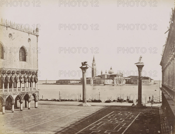 Petite Place Saint-Marc avec vue sur les Lagunes et Ile St. Georges., St. Mark's Square with two pillars and a view of Isola S. Giorgo in Venice, Venezia - Piazzetta due colonne e l'Isola S. Giorgio, photograph, Part of Topographical album of Venice 1881, check stamp: 'Carlo Ponti Venezia', negative number: '24', photographer: Carlo Ponti, Venice, 1860 - 1881, paper, albumen print, height 200 mm x width 260 mm, piece of sculpture, reproduction of a piece of sculpture, palace, square, circus, etc. (city(-scape) with figures, staffage), travel, St. Mark's Square, Isola di San Giorgio Maggiore, A wide waterfront scene shows a paved square in the foreground with geometric paving patterns and long shadows, flanked on the left by an ornate building facade with arched colonnades, circular windows, and decorative stonework, and on the right by a balustraded structure with lamps along its edge. Two tall columns rise near the water; one column is topped by a winged lion figure and the other by a...