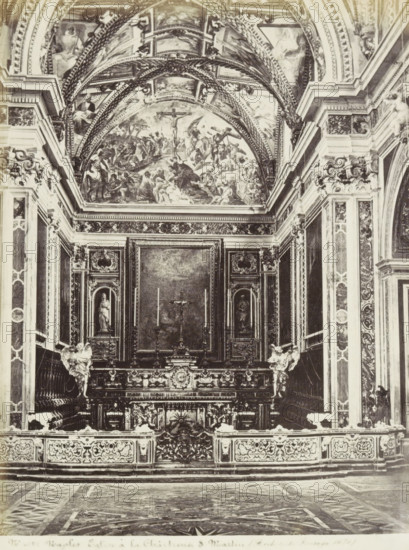 Church of the Monastery of San Martino in Naples, Naples Eglise à la Chartreuse S. Martin (Architecto Fanzago 1670), photograph, Part of Travel album with photos of sights in Naples and surroundings., negative number: '40...', Naples, c. 1865 - c. 1875, photographer, paper, albumen print, albumendruk, height 246 mm x width 185 mm, interior of church, altar, The image shows an ornate interior with a richly decorated altar area framed by carved columns and panels, a central altarpiece with a crucifix and tall candlesticks, sculpted figures flanking the altar, and elaborate reliefs and ornamentation covering the walls and balustrade; above the altar a vaulted ceiling features painted scenes and decorative arches, and the patterned floor in front extends toward the viewer.