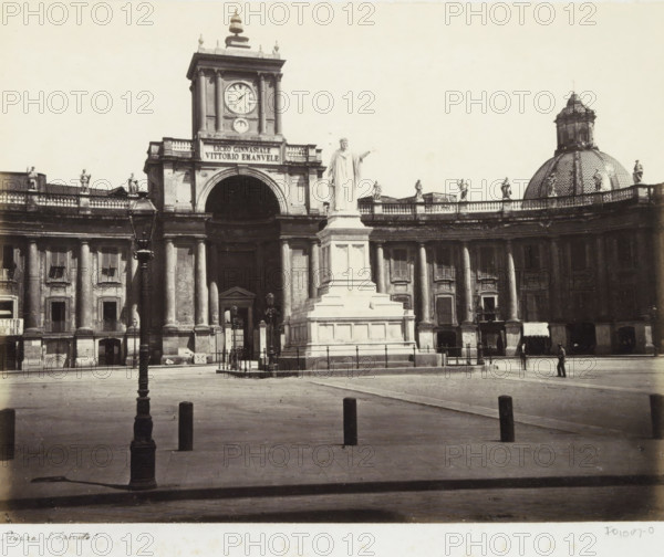 Piazza Dante in Naples with statue of Dante and the Lyceum Vittorio Emanuele, Piazza S. Spirito!, photograph, Part of Travel album with photos of sights in Naples and surroundings., Naples, c. 1865 - c. 1875, photographer, paper, albumen print, height 194 mm x width 253 mm, monument, statue, square, circus, etc. (city(-scape) with figures, staffage), secondary education (building, education, tuition), A wide plaza with a paved foreground leads to a curved colonnaded building topped by a balustrade with multiple standing statues, a central monumental arch flanked by tall columns, and a square clock tower rising above the arch; in front of the arch stands a large tiered pedestal supporting a draped standing statue with one arm extended, and to the right a patterned domed roof with a lantern rises behind the balustrade; a tall ornate lamppost is visible in the foreground, short bollards dot the plaza, and a few small figures stand near the building and on the open square.