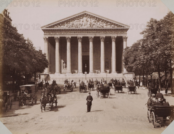 View of La Madeleine in Paris, album page, photograph, This photo is part of an album., inscription: '625. Paris. Eglise de la Madeleine. Ed. H. photot.', retailer's mark: 'E. Hautecoeur, Estampes Photographies, 35 Avenue de l'Opéra, 35, Paris', photographer: Edouard Hautecoer, Paris, 1890 - 1898, paper, albumen print, albumendruk, height 258 mm x width 355 mm, church (exterior), Madeleine, A wide neoclassical building with a triangular pediment decorated with sculpted figures sits behind a row of tall fluted columns with ornate capitals, flanked by dense rows of trees on both sides; a broad stone staircase and a low fence run across the building’s base where niches contain statues, and a lamppost stands centered in front of the entrance; a street in the foreground shows numerous horse-drawn carriages and riders moving toward and away from the building, with a uniformed policeman standing in the middle of the road and people walking along the sidewalks beneath the trees.