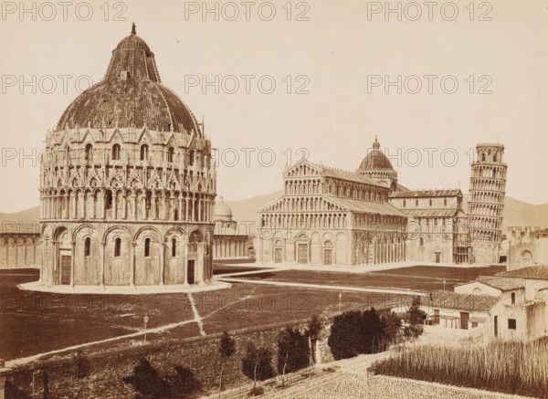View of the Cathedral and the Baptistery in Pisa, Italy, Il Duomo e il Battistero, Pisa, photograph, number: '3438.', address: 'GIACOMO BROGI, FOTOGRAFO EDITOR, FIRENZE, LUNG ARNO DELLE GRAZIE 15', photographer: Giacomo Brogi (possibly), publisher: Edizioni Brogi, Florence, 1864 - 1881, Tuscany, pasteboard, paper, albumen print, height 345 mm x width 471 mm, church (exterior), dome, architecture, Cathedral of Pisa, Baptistery (Pisa), A wide view of a historic square with large stone buildings including a round building with a domed, tiled roof in the foreground, a rectangular basilica with a pitched roof and arched facade behind it, and a leaning cylindrical tower with tiered arches to the right, all set on a paved plaza and surrounded by low walls, grassy areas with pathways, a foreground terrace with planted rows, and a few small buildings along the lower right edge.
