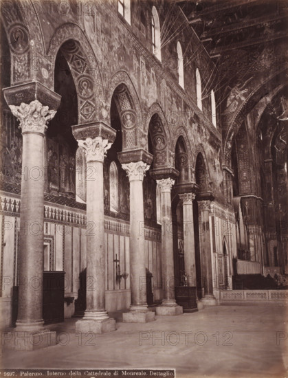 Interior of the Cathedral of Palermo, Italy, Interno della Cattedrale di Monreale. Dettaglio, Palermo, photograph, number: 'No 1697.', 1851 - 1900, photographer, Sicily, pasteboard, paper, albumen print, height 385 mm x width 309 mm, parts of church interior, Dom (Palermo), A wide interior view of a cathedral nave featuring a row of tall stone columns with ornate carved capitals supporting a series of rounded arches; the arches and upper walls are covered with detailed mosaics and painted medallions showing human figures and decorative patterns; narrow arched windows high on the wall allow light into the space; patterned friezes and rectangular panels decorate the lower walls; a few wooden furnishings and candle holders sit against the walls between the columns; the ceiling and upper arches display intricate ornamental designs and further figurative mosaics; the floor appears plain and open in the foreground.