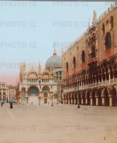 View of the Piazza San Marco towards the St. Mark's Basilica in Venice, Piazzetta dalle colonne, photograph, number: '52', Venice, 1851 - 1900, photographer, paper, albumen print, hand coloring, height 186 mm x width 242 mm, square, circus, church (exterior), parts of church exterior and annexes: campanile, St. Mark's Basilica, Doge's Palace, St. Mark's Square, A wide open paved square with a pale surface fills the foreground, leading to ornate historic buildings in the background; on the left a light-colored cathedral with domes and arched entrances shows decorative arches, columns, and sculpted details, while on the right a long facade of a brick building features rows of arched openings, colonnades, and carved ornamentation, with lamp posts standing along the square and a few small figures walking or standing near the buildings.