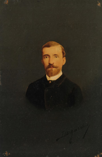 Portrait of an unknown man, photograph, inscription: 'Dugardin', inscription: 'Ma... parterre?, 23389., mort a millan, 1 Février 94?, souvenir a sa chère, Eg...', 1880 - 1900, photographer, plant material, biological material, wood (plant material), paper, paint (coating), albumen print, hand coloring, hand-colored albumen print, pasted on wooden panel, height 143 mm x width 95 mm x depth 7 mm, adult man, anonymous historical person depicted, A portrait of a man from the chest up against a dark, textured background, showing a fair-skinned face with short, light brown hair, a trimmed mustache and beard, neutral expression, and brown eyes; he is wearing a dark coat with a high collar and a white shirt peeking above the collar.