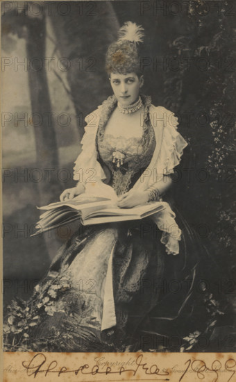 Portrait of Alexandra, Princess of Wales, frame, photograph, address: '52 Gower Street London', inscription: 'Together with on the same are, framed portrait of mand?, Queen of Norway, daughter, of Edward VII and Alexandra, (photo Alice Hughes) purchased, ... 1981 from lot of Clarke, Manchester (asking price of the, two photos f. 375-), Alexandra, wife of Edward VII, Queen of England, born, Princess of Denmark., photo published in Gurnsheim, Hastings ? first edition', inscription: 'Alexandra 1899', copyright notice: 'Copyright', photographer: Alice Hughes, London, 1899, paper, plant material, pasteboard, biological material, tape, inorganic material, materials by function, wood (plant material), glass, metal, baryta paper, ink, pressure-sensitive tape, gelatin silver print, pen, developing gelatin silver print, in wooden frame, height 233 mm x width 165 mm x depth 14 mm, Person, Alexandra of Denmark (Queen of England), historical persons - BB - woman, princess, A seated woman in an orna...