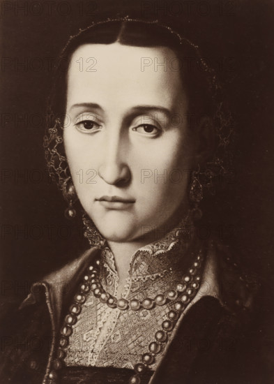 A. Bronzino: Herzogin Eleonore, Photo reproduction of a painted portrait of Eleonora de' Medici by Angelo Bronzino, photograph, reproduction, page, after painting by Angelo Bronzino, publisher: Photographische Gesellschaft Berlin, Berlin, c. 1870 - in or before 1875, Angelo Bronzino, Photographische Gesellschaft Berlin, photographer, after painting by, publisher, paper, albumen print, height 230 mm x width 166 mm, Photo on unnumbered page., Person, Eleonora de' Medici, historical persons - BB - woman, princess, A close-up, sepia-toned portrait of a woman showing her head and upper torso, with a smooth, pale face, straight dark hair parted in the center and pulled back, slightly downcast eyes, a straight nose, and a closed mouth with a neutral expression; she wears a delicate lace collar and layered beaded necklaces, earrings that hang beside her face, and a dark garment with visible fabric texture and ornamental trim.