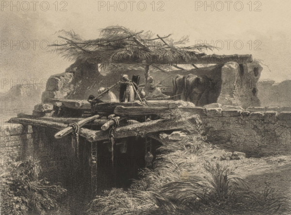 Irrigation system in the vicinity of Luxor, Sâkîeh. Irrigation machine. (Environs de Louqsor), Egypt, L'orient artistique et pittoresque, Artistic and picturesque impressions of countries in the East, print, printmaker: Adolphe Mouilleron, after drawing by Émile Prisse d'Avennes, printer (person): Victor Jacques Bertauts (possibly), Paris, 1851 - 1880, Adolphe Mouilleron, Émile Prisse d'Avennes, Victor Jacques Bertauts, printmaker, after drawing by, printer (person), paper, chine collé, lithography, lithography with planing technique on chine collé, proof print, height 311 mm x width 447 mm, Series title based on later condition and relationship with other prints from the series 'L'orient artistique et pittoresque'. This series consists of an unknown number of prints. On the later state of this print is number 1., irrigation, cultivation, North Africa, Luxor, A detailed charcoal or pencil scene of a rustic riverside structure with rough wooden beams, tied ropes, and weathered posts ext...