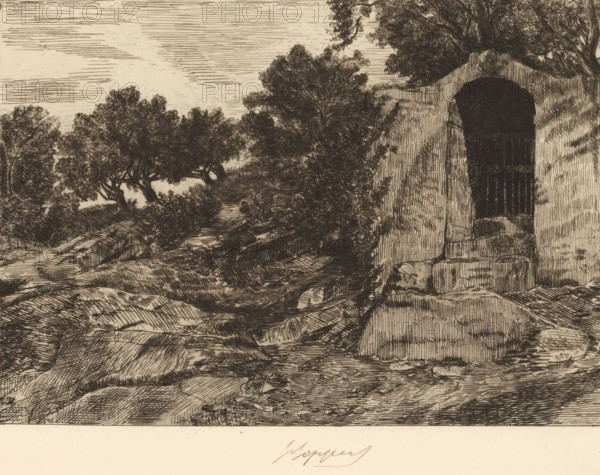 Chapel-shaped ruin with fence in rocky landscape, print, printmaker: Karel Theodoor Hippert, 1849 - 1910, paper, etching, intaglio printmaking technique, etching with plate tone, height 235 mm x width 321 mm, landscape with ruins, rocks, A detailed ink landscape showing rocky ground and a rough pathway leading toward a dark arched opening set into a stone structure at the right, the archway framed by vertical wooden slats and shadowed interior, with textured stone blocks at its base; to the left and center a slope covered in bushes and grass rises toward a cluster of trees with dense, leafy canopies rendered in fine lines, and a sky above filled with horizontal hatch marks.