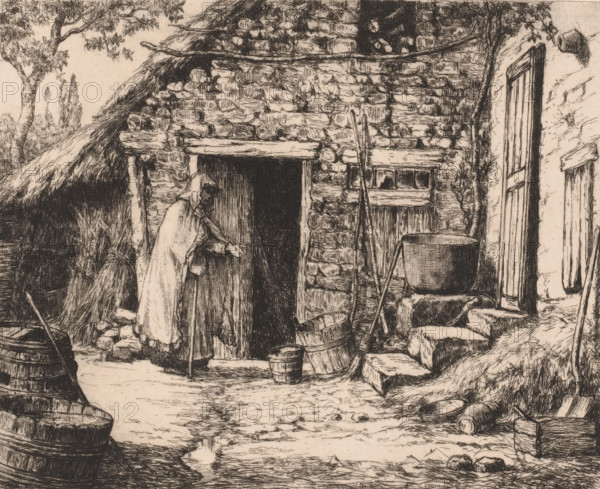 Beggar at the door of a farm, print, printmaker: Frans Van Kuyck, 1862 - 1911, paper, etching, intaglio printmaking technique, etching with plate tone, height 188 mm x width 227 mm, farm (building), beggar, A detailed ink drawing of a stone cottage exterior shows a thatched roof and a wooden door set in a rough stone wall, with a cloaked figure standing at the threshold reaching toward the door. Around the entrance are wooden buckets and barrels, a large cauldron set on a stand, leaning poles and tools, steps made of irregular stones, and a small window with wooden shutters. Trees and foliage appear behind the cottage and to the left, and grasses and scattered stones cover the ground in front.