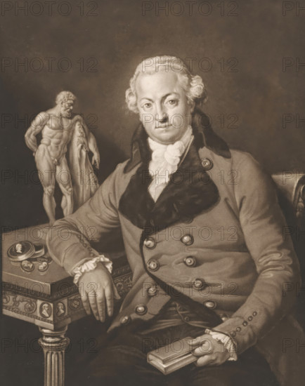 Self-portrait, print, printmaker: Josef Clarot, 1780 - 1820, paper, mezzotint, proof, height 381 mm x width 269 mm, Person, sculpture, portrait, self-portrait of artist, (story of) Hercules (Heracles), book, ornaments, jewels, A seated man in historical clothing with a fur-trimmed coat and ruffled cravat looks toward the viewer, his hair styled in a powdered, curled fashion. His right arm rests on an ornate table with a decorative edge, and his left hand holds a closed book. On the table beside his arm are a small open case and round objects arranged nearby. Behind and to the side of the man stands a nude male statue draped with a cloth, positioned on a plinth. The scene is rendered in sepia tones with a plain, darker background.