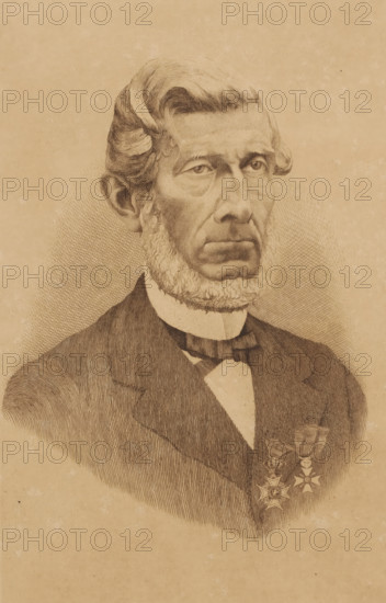 Portrait of an unknown man, possibly Dorzée, print, inscription: 'Mois 2x m 1897', printmaker: Georges Montenez (signed by artist), 1897, paper, etching, intaglio printmaking technique, etching with plate tone, height 295 mm x width 199 mm, Titled in the inventory: Portrait of Mayor Dorzée., historical persons, adult man, beard, A sepia-toned engraved portrait of an older man shown from the chest up, featuring detailed line work. He has a high forehead with swept-back hair, pronounced sideburns that form a full beard along his jaw, and a serious expression with deep-set eyes and a furrowed brow. He wears a dark suit jacket over a light shirt with a high collar and a bow tie. Two decorative medals with ribbon bows are pinned to his jacket on the visible side. The background is plain with subtle crosshatch shading around the figure.