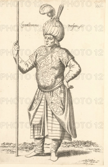 Gentilhomme Persien, Persian man, print, album page, book illustration, Print is part of an album., printmaker: Léon Davent, after drawing by Luca Penni (attributed to), after drawing by Nicolas de Nicolay (possibly), publisher: Guillaume Rouille (I), Lyon, 1555 - 1568, Attributed to, paper, etching, pasted on album page, height 268 mm x width 171 mm, A standing figure in patterned clothing and layered garments holds a long staff with one hand while the other rests on the hip, wearing a large wrapped headpiece topped with a plume and a decorative stick, with detailed floral and swirling designs on the upper garment and apron-like front panels, striped lower panels, wrapped leg coverings, simple pointed shoes, and a neutral facial expression; the background is plain with small patches of ground and vegetation at the figure's feet.