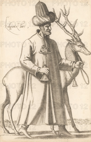 Turkish cleric with deer and goblet, Religieux Turc, print, album page, book illustration, Print is part of an album., printmaker: Léon Davent, after drawing by Luca Penni (attributed to), after drawing by Nicolas de Nicolay (possibly), publisher: Guillaume Rouille (I), Lyon, 1555 - 1568, Attributed to, paper, etching, pasted on album page, height 266 mm x width 173 mm, A monochrome engraved scene shows a robed male figure standing beside a deer with large branching antlers; the man wears a tall, wrapped turban and a long cloak that falls to his feet, and he has a bearded face in profile. He holds a tall ornate candlestick with a decorative top in one hand and the deer’s reins in the other, while a bell hangs from the deer's neck. The deer’s head is turned slightly toward the viewer, its textured fur and detailed antlers prominent, and the lower portion of both figures shows draped fabric, boots, and the animals’ slender legs on a simple ground. The background is plain and unadorned.
