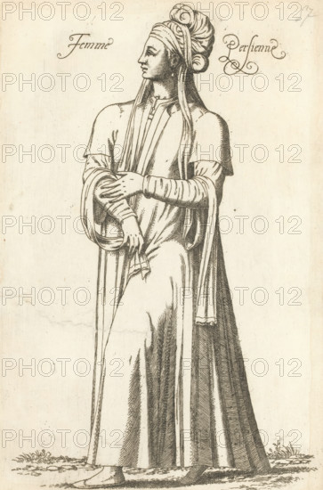 Persian woman, Femme Persienne, print, album page, book illustration, Print is part of an album., printmaker: Léon Davent, after drawing by Luca Penni (attributed to), after drawing by Nicolas de Nicolay (possibly), publisher: Guillaume Rouille (I), Lyon, 1555 - 1568, Attributed to, paper, etching, mounted on album page, height 274 mm x width 172 mm, A monochrome line drawing of a standing woman in a long flowing gown and layered outer garments, shown in profile facing left; she wears a wrapped turban with coiled details and long draped fabric extending down from the head covering, a fitted bodice with vertical folds, and sleeves with wrapped bands; her right hand rests on her left forearm while her left hand holds a piece of cloth, and a long staff or walking stick stands beside her, touching the ground where small tufts of grass and a simple textured surface are visible.
