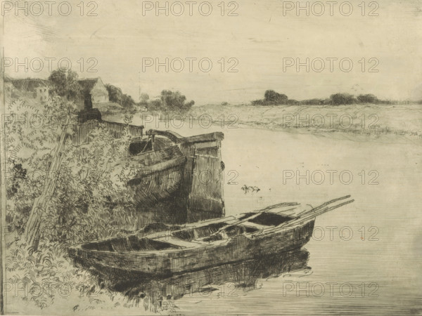 River with boats at the waterside, print, printmaker: Cornelis Vreedenburgh, 1890 - 1946, paper, etching, intaglio printmaking technique, height 146 mm x width 197 mm, rowing-boat, canoe, sailing-ship, sailing-boat, river, A wide, shallow riverbank scene rendered in fine, dark line work shows several wooden rowboats pulled up on the shore, their hulls and internal planks visible, with oars resting across one of them. Dense foliage and leafy plants grow along the left edge, interspersed with a leaning wooden post or rail. Behind the vegetation, low buildings with sloped roofs and clustered trees recede into the distance. The calm water stretches toward a flat horizon with distant treelines and marshy grasses, and the sky above is pale and largely empty, textured with subtle horizontal and faint diagonal lines.