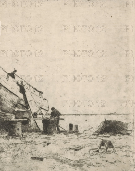 Shipyard, print, Shipyard with figure working on a boat. Left part of the print is torn off., printmaker: Cornelis Vreedenburgh, Netherlands, 1890 - 1946, paper, etching, intaglio printmaking technique, height 194 mm x width 163 mm, pier, quay, wharf, A faded, sepia-toned scene with fine, sketch-like line work showing a shoreline area; at the left a large slanted sail or tarp attached to a structure with visible ropes and wooden beams, nearby a person crouched or seated on a platform above a barrel, their head bowed and clothing rendered in dark crosshatching; assorted wooden objects and small barrels sit on the ground and platform, with rough grassy patches and scattered planks in the foreground; to the right a small, overturned boat rests on the shore, and a simple wooden stool or low ladder stands among the grass; the horizon is low and faint, and the sky occupies most of the upper area as a lightly textured, empty expanse.