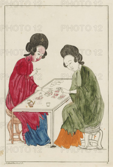 Two Chinese women playing a card game, Chinese women, flowers and birds, print, album page, ornamental print, Series number, 2, 12, Print is part of an album., printmaker: Pieter Schenk (II) (possibly), Amsterdam, after print by anonymous (possibly), 1727 - 1775, unknown, after print by, grantor of privilege, paper, etching, hand coloring, etching hand-colored in red, blue, green and orange, height 240 mm x width 168 mm, playing-cards, Chinese (women), Two women sit opposite each other at a low rectangular table with playing cards spread across its surface; the woman on the left wears a red robe with a blue skirt visible beneath and has a high dark hairstyle adorned with a small floral hair ornament, while the woman on the right wears a green robe over an orange skirt and has a similarly styled dark coiffure. The left woman is leaning forward with one hand pointing toward the cards and the other resting on the table, and the right woman is also leaning in with one hand hovering over th...