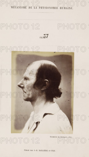 Portrait of a subject: 'un vieillard', photograph, page, Unnumbered page with photo 37 from Mécanisme de la physionomie humaine ou analyze électro-physiologique de l'expression des passions (Atlas)., photographer: Guillaume Benjamin Amand Duchenne, France, publisher: JB Baillière et Fils, Paris, c. 1860 - in or before 1862, Guillaume Benjamin Amand Duchenne, JB Baillière et Fils, photographer, publisher, paper, albumen print, albumendruk, height 119 mm x width 89 mm, experiment, test, science and technology, old man, face, morphology of facial expression, physiology and anatomy, physiognomy, nervous system, neurology, A sepia-toned portrait photograph of an older man shown in profile facing left, with a receding hairline and short dark hair at the back tied into a small knot, visible wrinkles and textured skin on his face and neck, a prominent nose and thin lips, wearing a light-colored collared garment, the rectangular photograph is mounted on a light page with a faint darker rectangu...