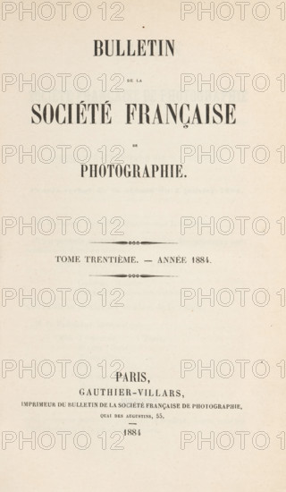 Bulletin de la Société française de photographie. Tome trentième - année 1884, book, number: '30', printer (person): Gauthier-Villars, Paris, 1884, printer (person), pasteboard, biological material, paper, leather, marbled paper, blotting paper, letterpress printing, cloud marbling, Spanish marbled paper, gold print, color on cut, collotype, height 240 mm x width 162 mm x thickness 22 mm, A vertically oriented aged paper page with large bold serif headings centered near the top and middle, smaller serif lines of text and decorative horizontal ornaments between blocks of text, a light beige background with subtle texture and tiny speckles, and a centered block of smaller text and ornamental marks toward the lower half.