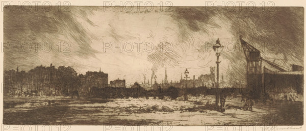 Harbour quay with lampposts in Rotterdam, print, A crane in the background on the right., printmaker: Willem Adrianus Grondhout (signed by artist), 1888 - 1934, paper, etching, intaglio printmaking technique, height 128 mm x width 322 mm, harbour, street lighting, Rotterdam, A wide sepia-toned cityscape rendered in fine etched lines shows a riverside scene with a low bridge crossing the water, silhouetted buildings and spires along the distant skyline, and a cloudy, textured sky above. In the foreground the riverbank displays rippling water and reflections, with a tall ornate street lamp standing near the edge. On the right a skeletal industrial crane and warehouse structure rise above the bank, while small indistinct human figures and clusters of shapes occupy the riverside near the crane and along the distant shore. The overall image is composed of dense cross-hatching and subtle tonal variations.