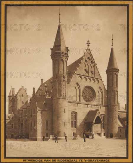 View of the Ridderzaal, Exterior of the Ridderzaal in The Hague, photomechanical print, 1900 - 1950, paper, rotogravure, height 191 mm x width 156 mm, city-view, and landscape with man-made constructions, The Hague, Binnenhof, Knight's Hall, A sepia-toned photograph of a large brick building with Gothic architectural features, including pointed towers with conical roofs, arched windows, decorative stonework along the roofline, and a large circular stained-glass window set into a triangular gable; a covered entrance with columns and steps is visible at street level, with several small human figures walking or standing on the paved plaza in front of the building; surrounding the main structure are adjoining brick facades and rooftops with chimneys and stepped gables, and tram or overhead wires cross the scene.